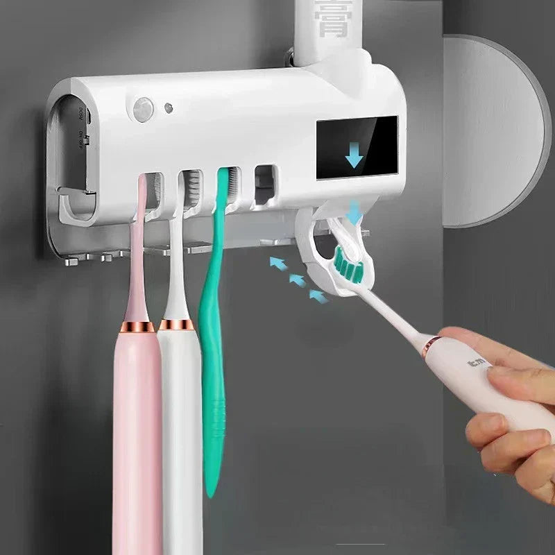 Automatic toothpaste dispenser with toothbrush holder
