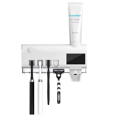Automatic toothpaste dispenser with toothbrush holder